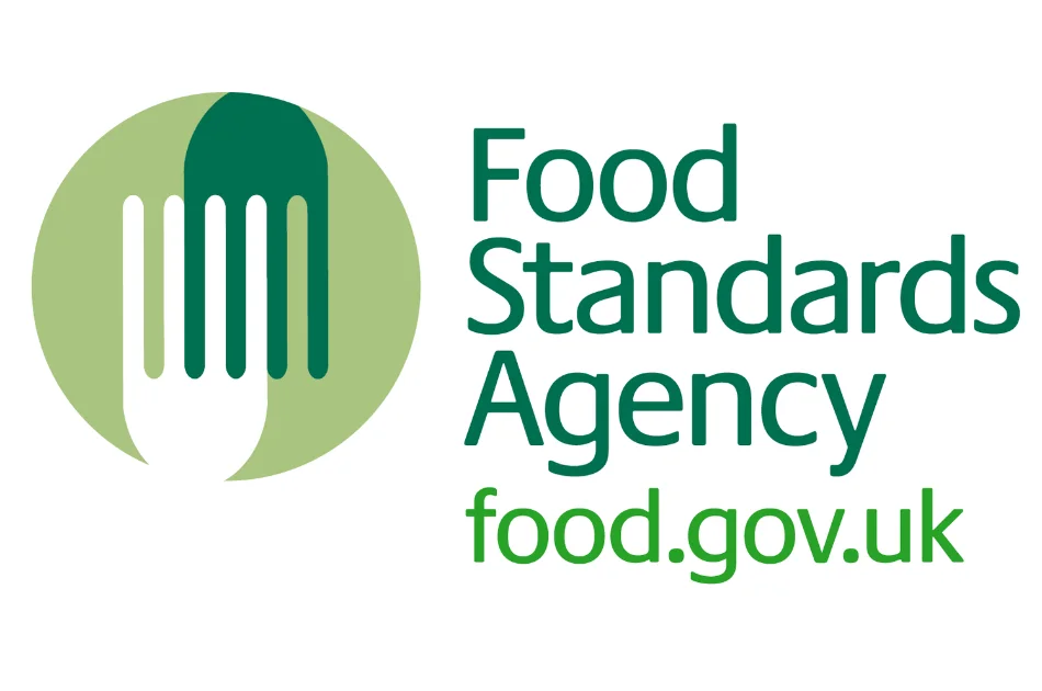 Food Standards Agency logo with a stylised fork inside a green circle, and the text Food Standards Agency food.gov.uk to the right, representing their commitment to food safety for small food businesses and micro food businesses.